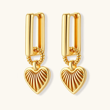 18K gold-plated rectangular huggie hoops with twisted rope ring and ribbed sunray heart charm pendant, on white background.